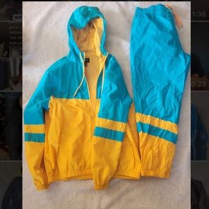 Matching windbreaker and pants, mens size L